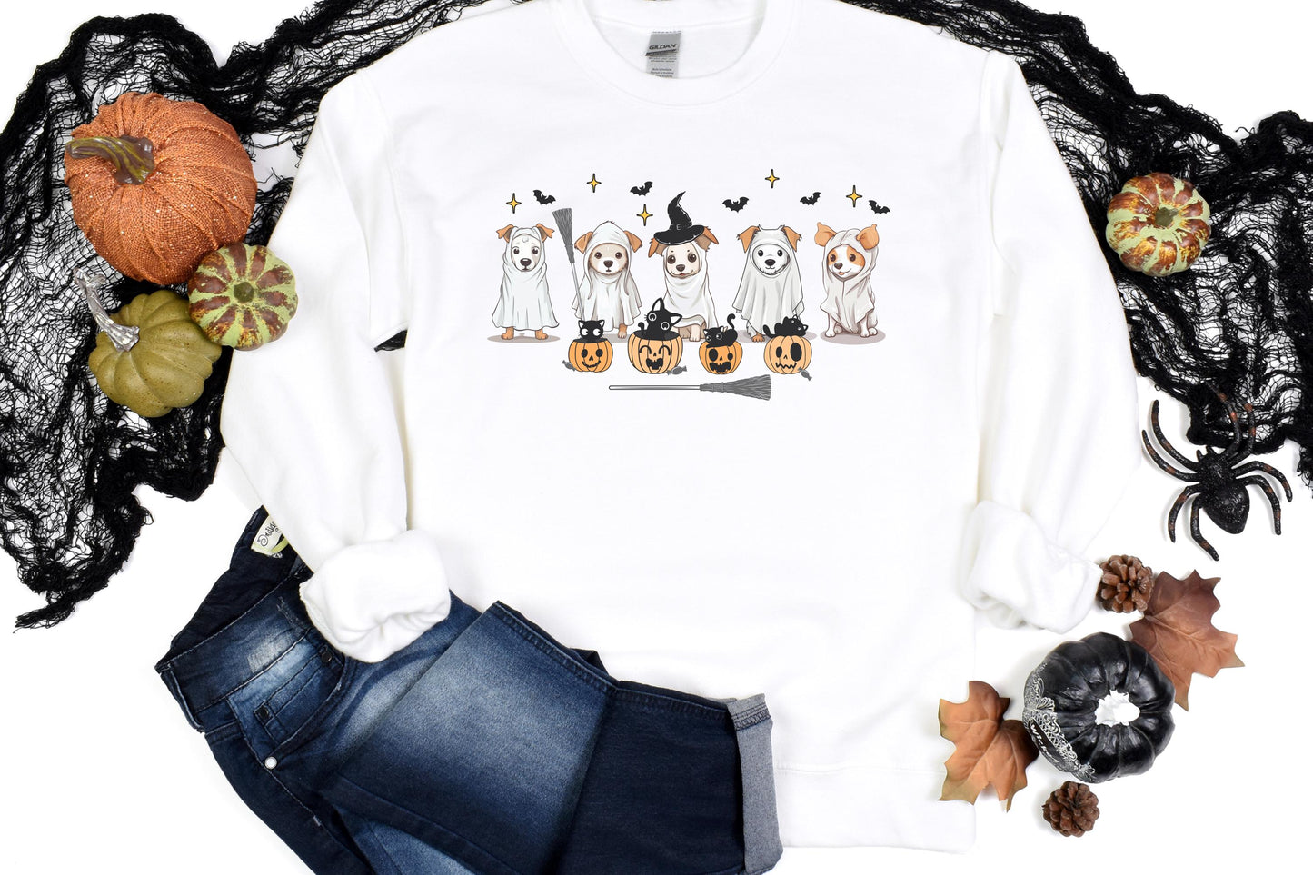 Halloween sweatshirt with five dogs dressed as ghosts, surrounded by bats, black cats, and jack-o’-lanterns for a playful spooky-season design.
