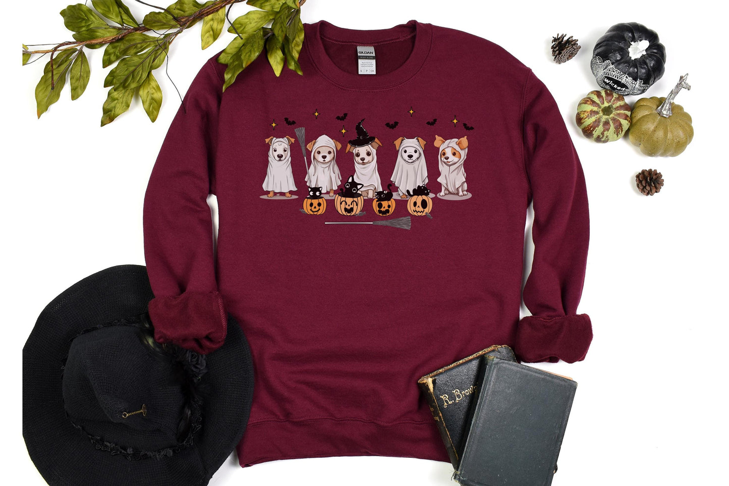 Halloween sweatshirt with five dogs dressed as ghosts, surrounded by bats, black cats, and jack-o’-lanterns for a playful spooky-season design.