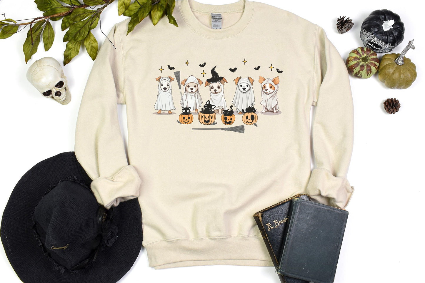 Halloween sweatshirt with five dogs dressed as ghosts, surrounded by bats, black cats, and jack-o’-lanterns for a playful spooky-season design.