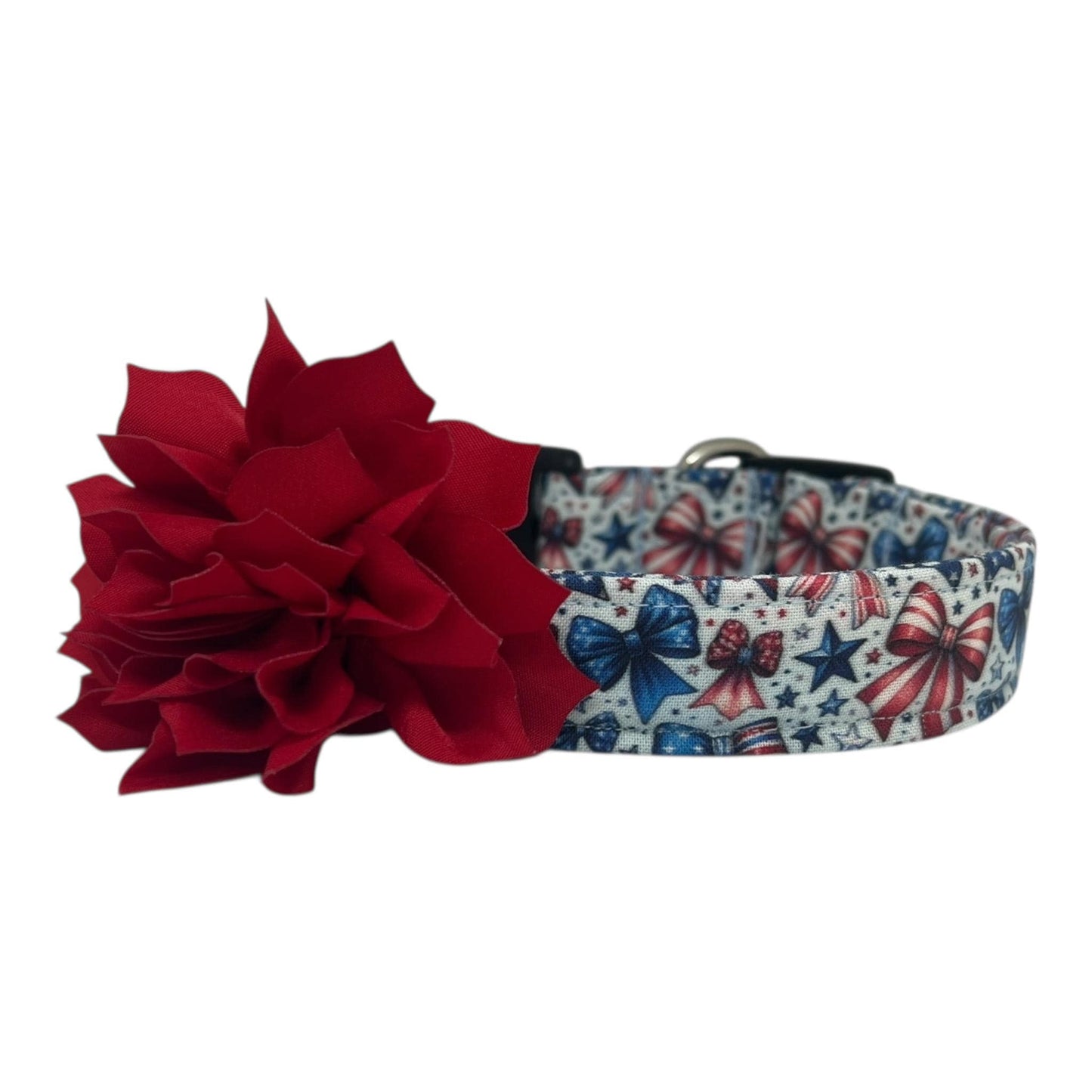 Patriotic dog collar with red, white, and blue bows and stars on a light background, shown with a detachable flower accessory in the color of your choice.