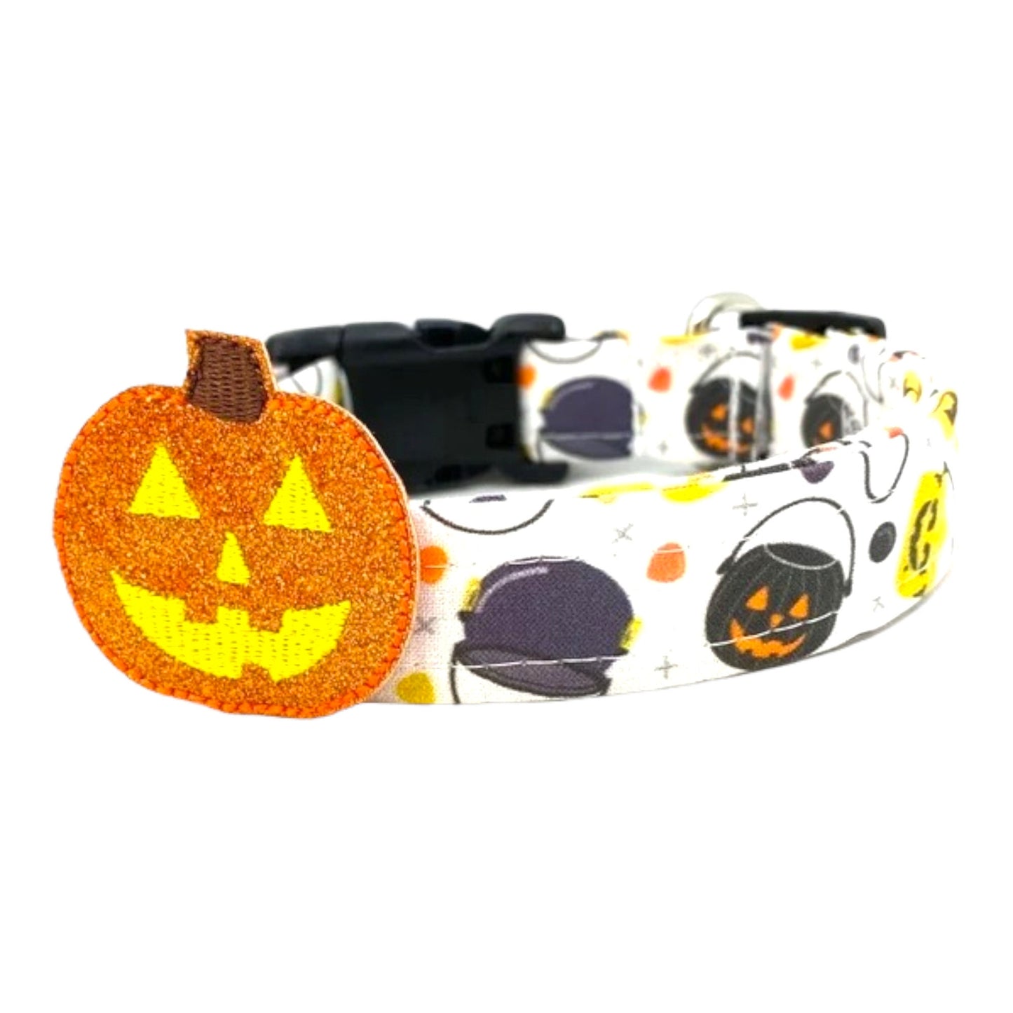 Halloween-themed dog collar with jack-o'-lantern design on a white background