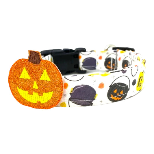 Halloween-themed dog collar with jack-o'-lantern design on a white background