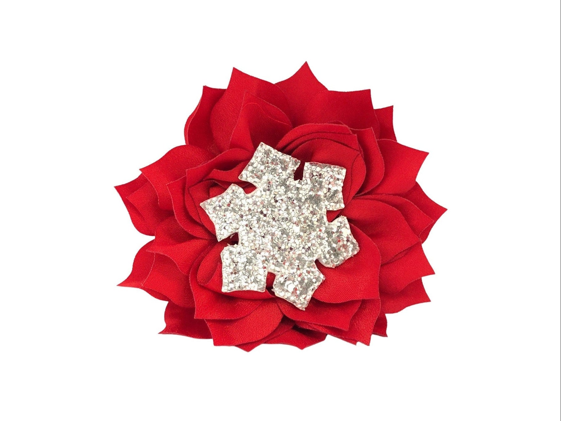 Chunky silver glitter snowflake embellishment attached to a red fluffy dog collar flower.