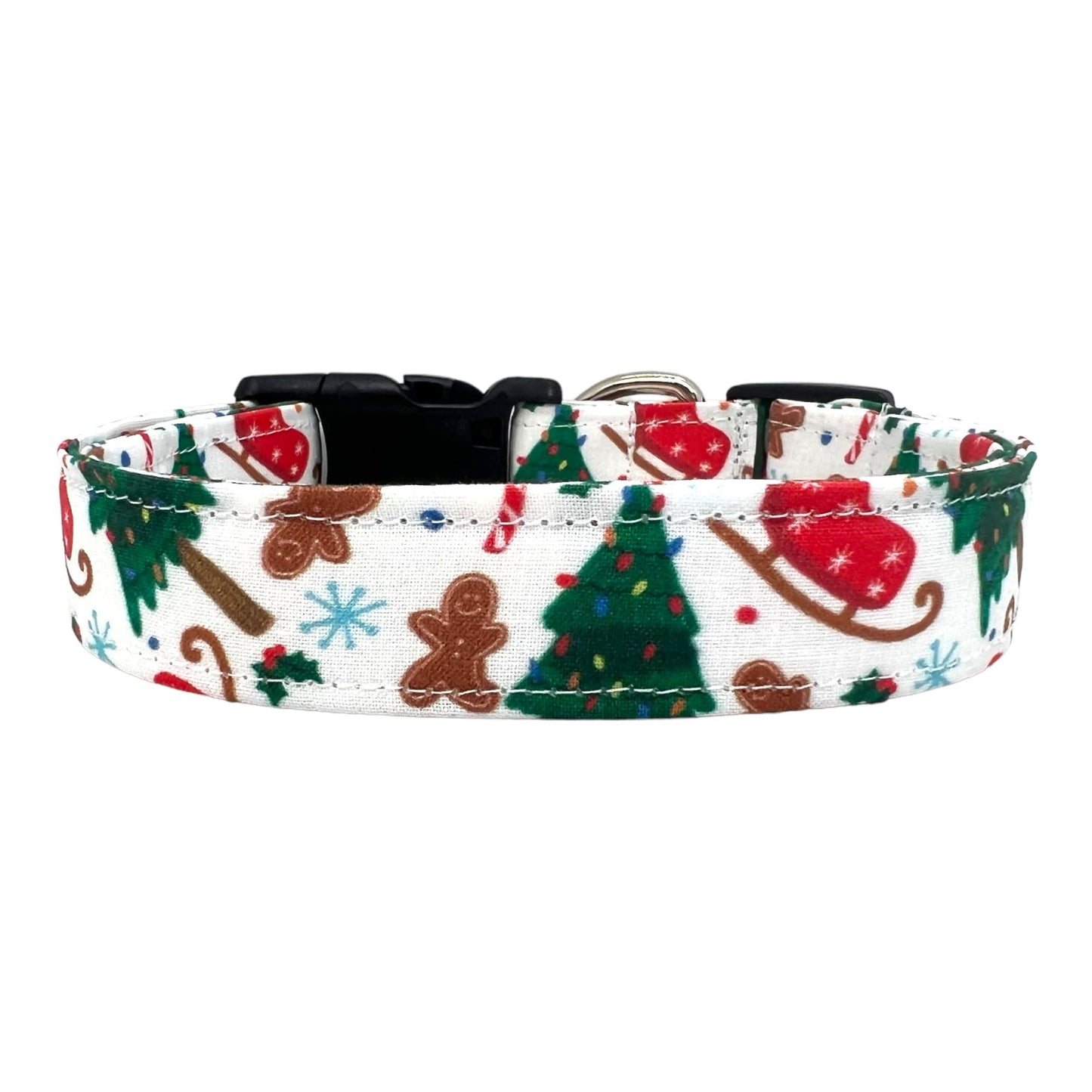 Festive dog collar featuring a pattern of Christmas trees, sleds, and gingerbread cookies.