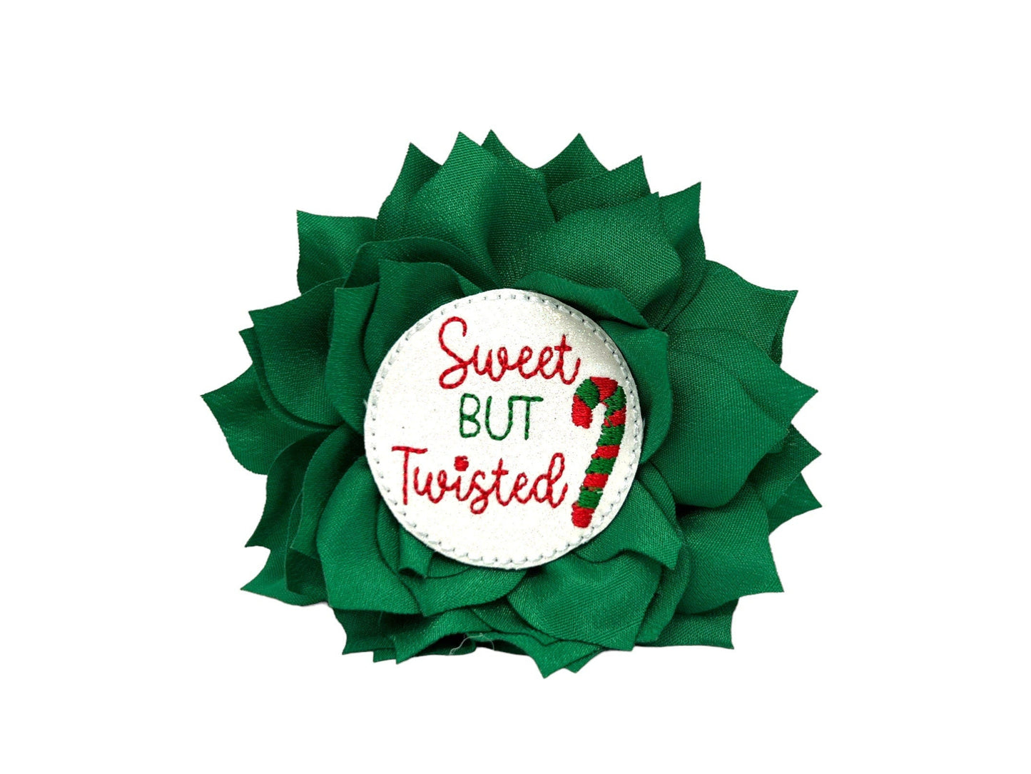 Emerald green dog collar flower with layered petals and a sparkly “Sweet but Twisted” candy cane embellishment in the center, shown in a 4-inch size with an elastic loop for easy attachment.