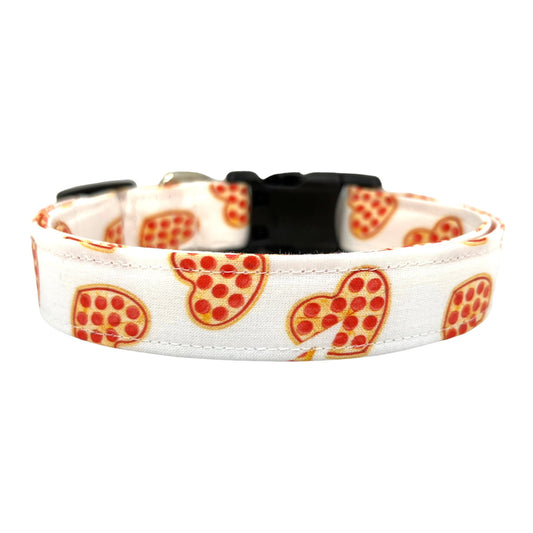 Valentine’s Day dog collar with heart-shaped pepperoni pizza pattern on white fabric