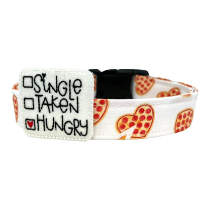 Dog collar with 'Single, Taken, Hungry' text and pizza pattern on a white background