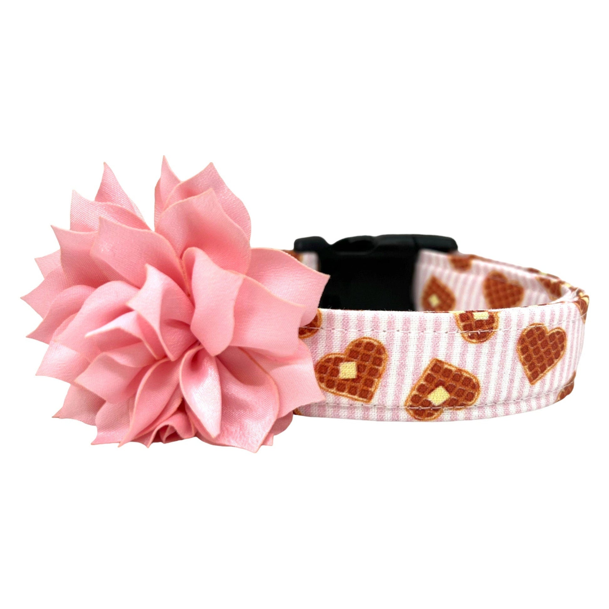 Valentine’s Day dog collar with waffle heart pattern on pink and white striped fabric with removable light pink dog collar flower embellishment.