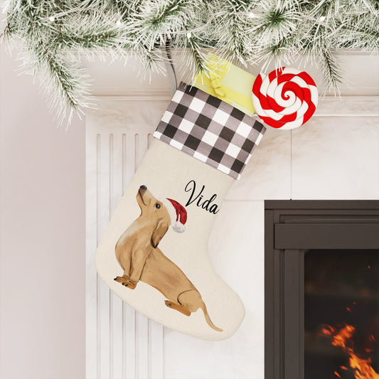 Personalized Christmas stocking featuring an illustrated Dachshund wearing a Santa hat, displayed on a festive white/black buffalo plaid stocking with dog's name.