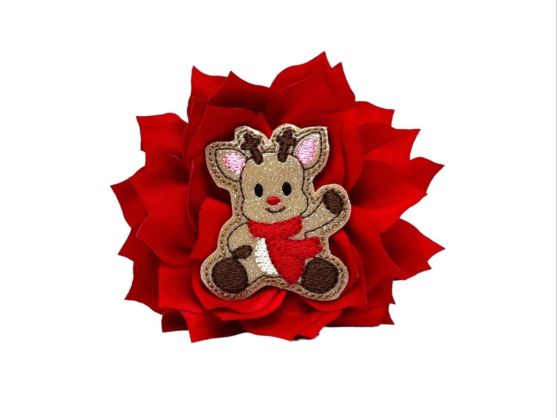 Red dog collar flower with layered petals and a sparkly reindeer embellishment in the center, shown in a 4-inch size with an elastic loop for easy attachment.