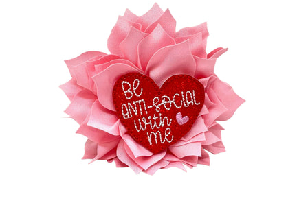 Valentine’s Day dog collar flower with heart embellishment and fluffy layered petals, shown in a 4-inch light pink size with elastic collar loop.