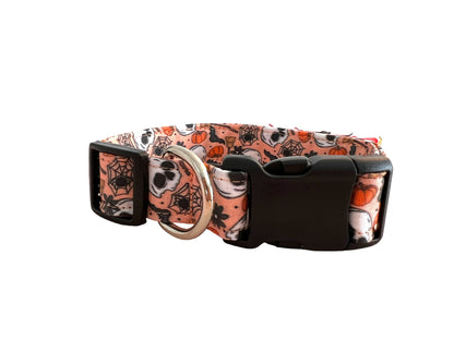 Dog collar with Halloween-themed pattern on a white background
