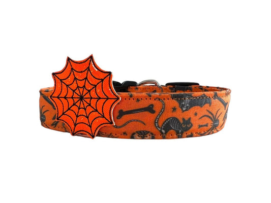 Halloween dog collar with x-ray bats, owls, rats, ravens, crossbones, and a detachable orange spiderweb embellishment.
