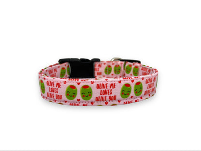 Dog collar with green olives and text that says "olive me loves olive you" on a white background