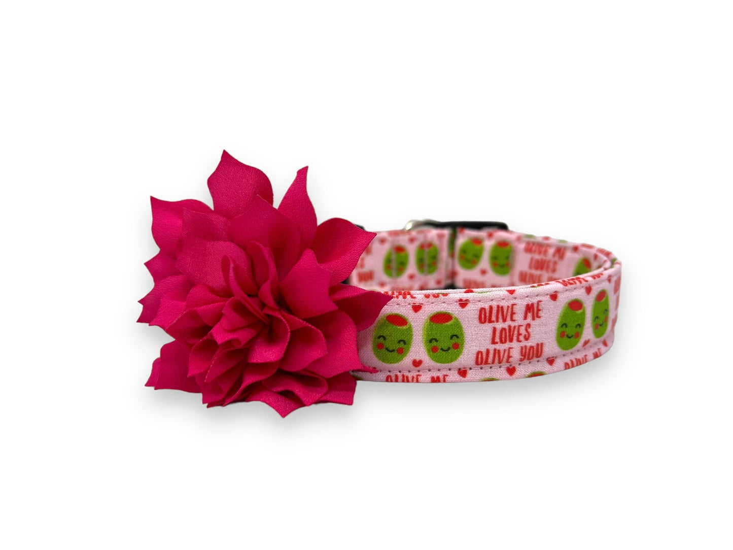 Light pink Valentine’s Day dog collar with heart-shaped olive pattern, “Olive Me, Loves Olive You” text, and removable shocking pink flower embellishment.
