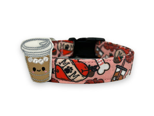 Valentine’s Day dog collar with MOM heart design, paw print detail, coffee, roses, dog bones, chocolate strawberries, and removable iced coffee embellishment accessory.
