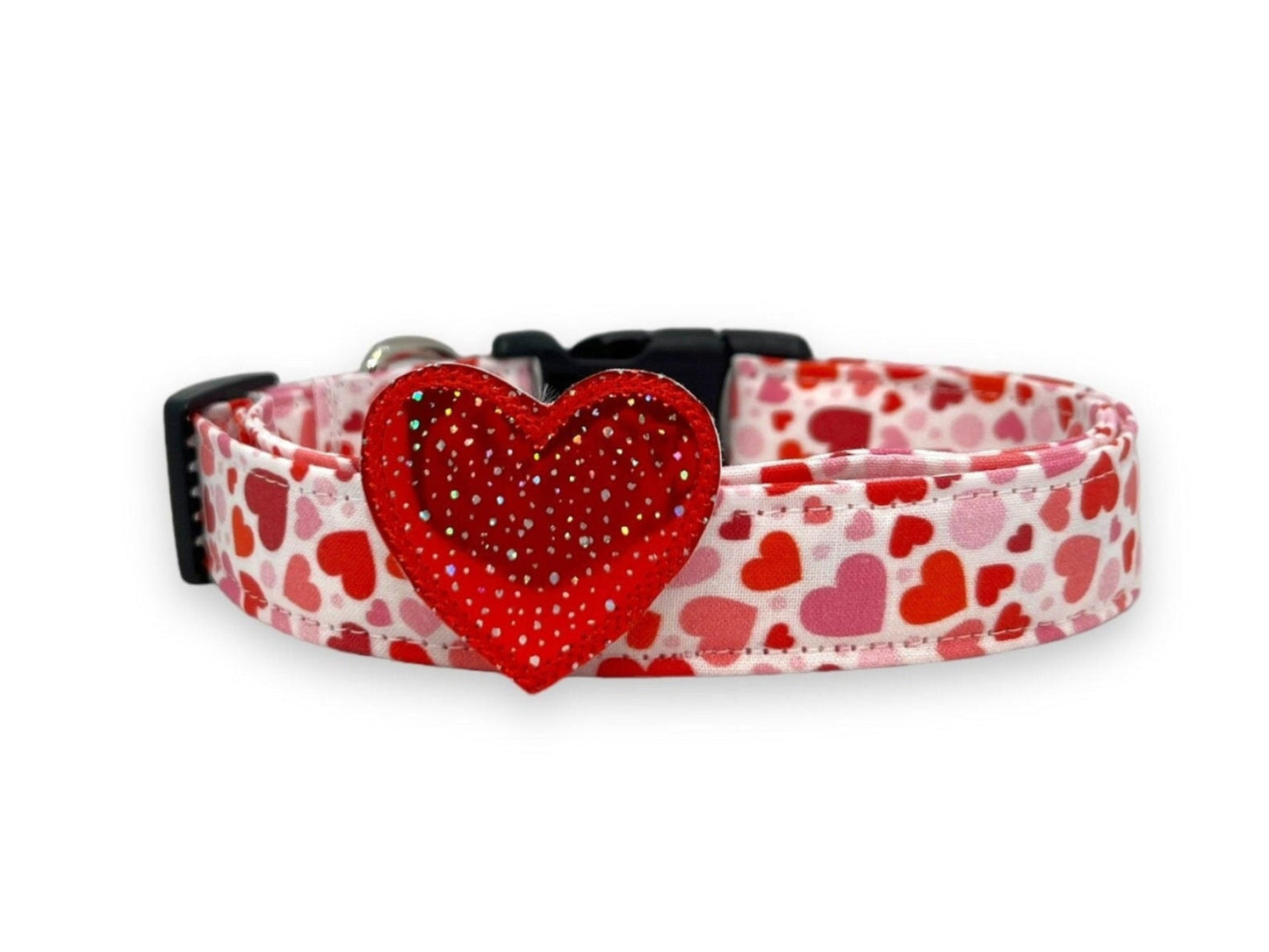 Valentine’s Day dog collar with red and pink heart pattern and removable red speckled heart embellishment