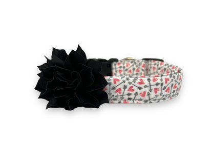 Valentine’s Day dog collar with pink hearts and black arrow pattern and removable black dog collar flower embellishment
