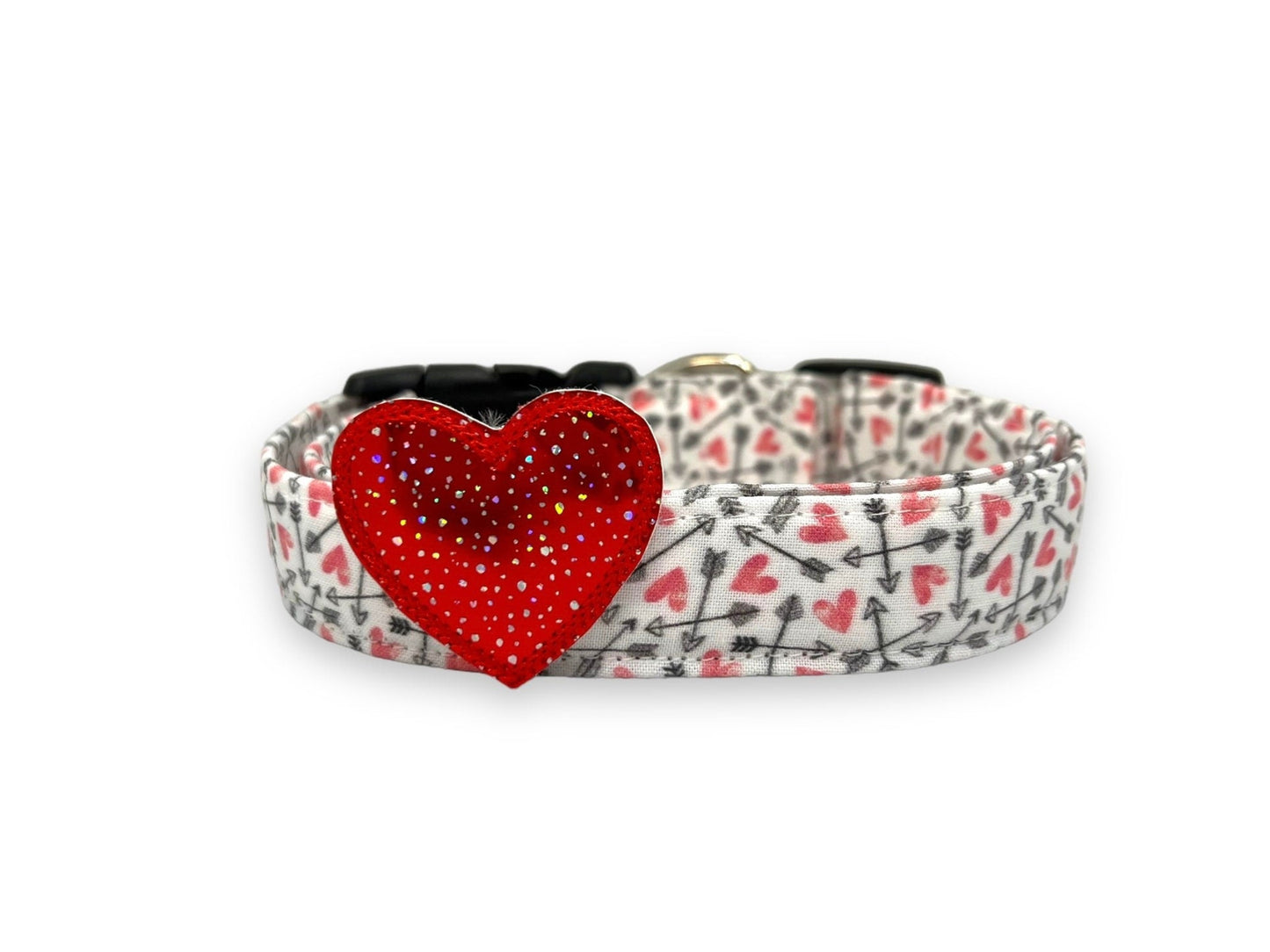 Valentine’s Day dog collar with pink hearts and black arrow pattern and removable speckled red heart embellishment