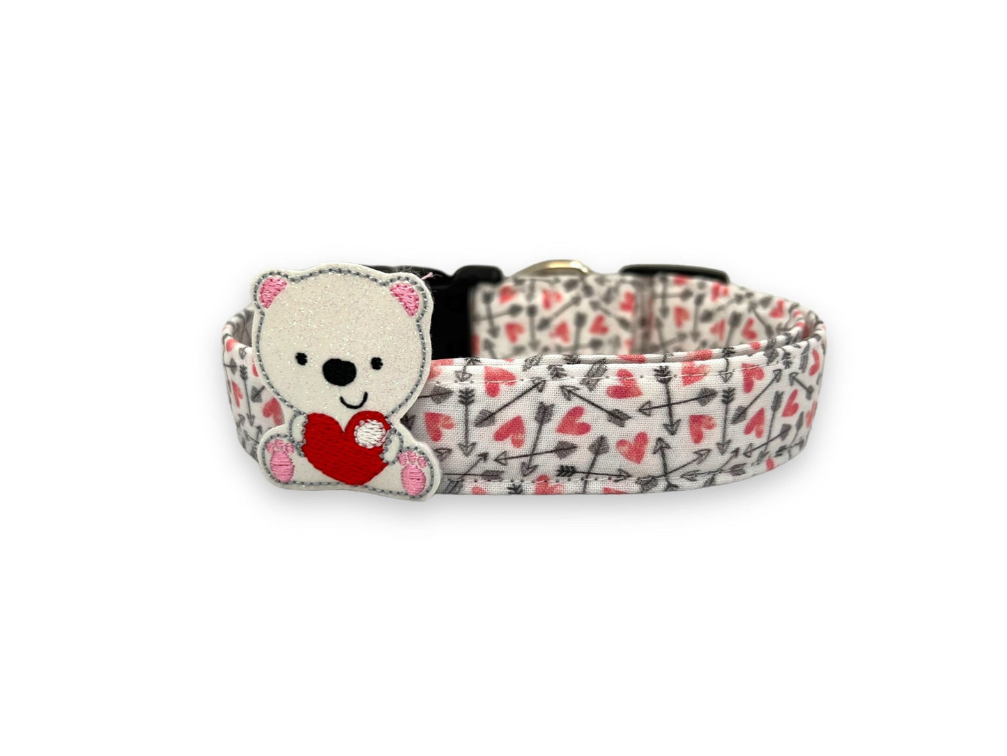 Valentine’s Day dog collar with pink hearts and black arrow pattern with polar bear embellishment