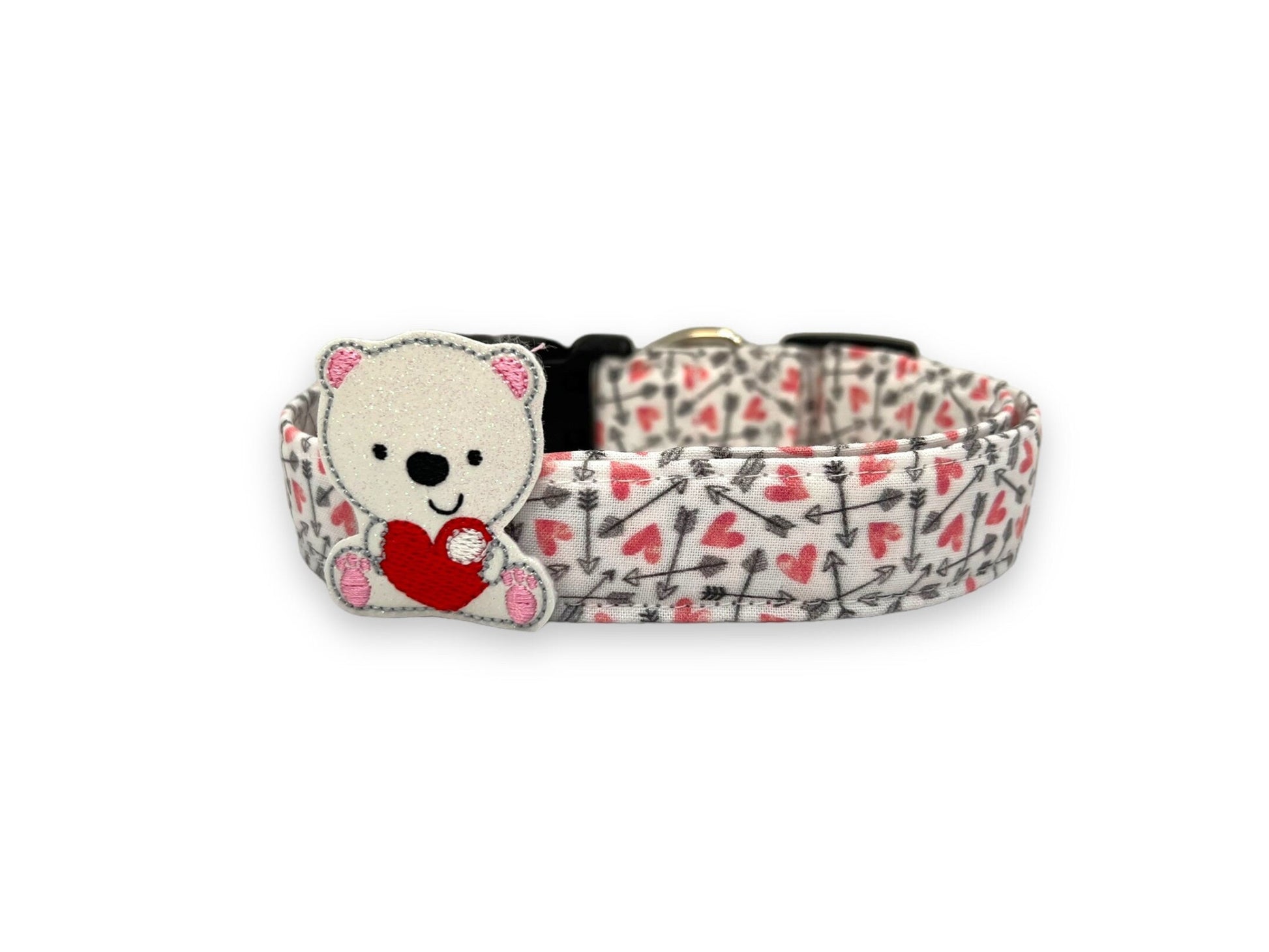 Valentine’s Day dog collar with pink hearts and black arrow pattern with polar bear embellishment