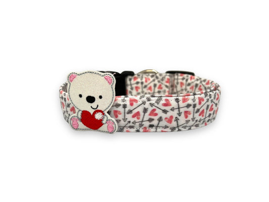 Valentine’s Day dog collar with pink hearts and black arrow pattern with polar bear embellishment