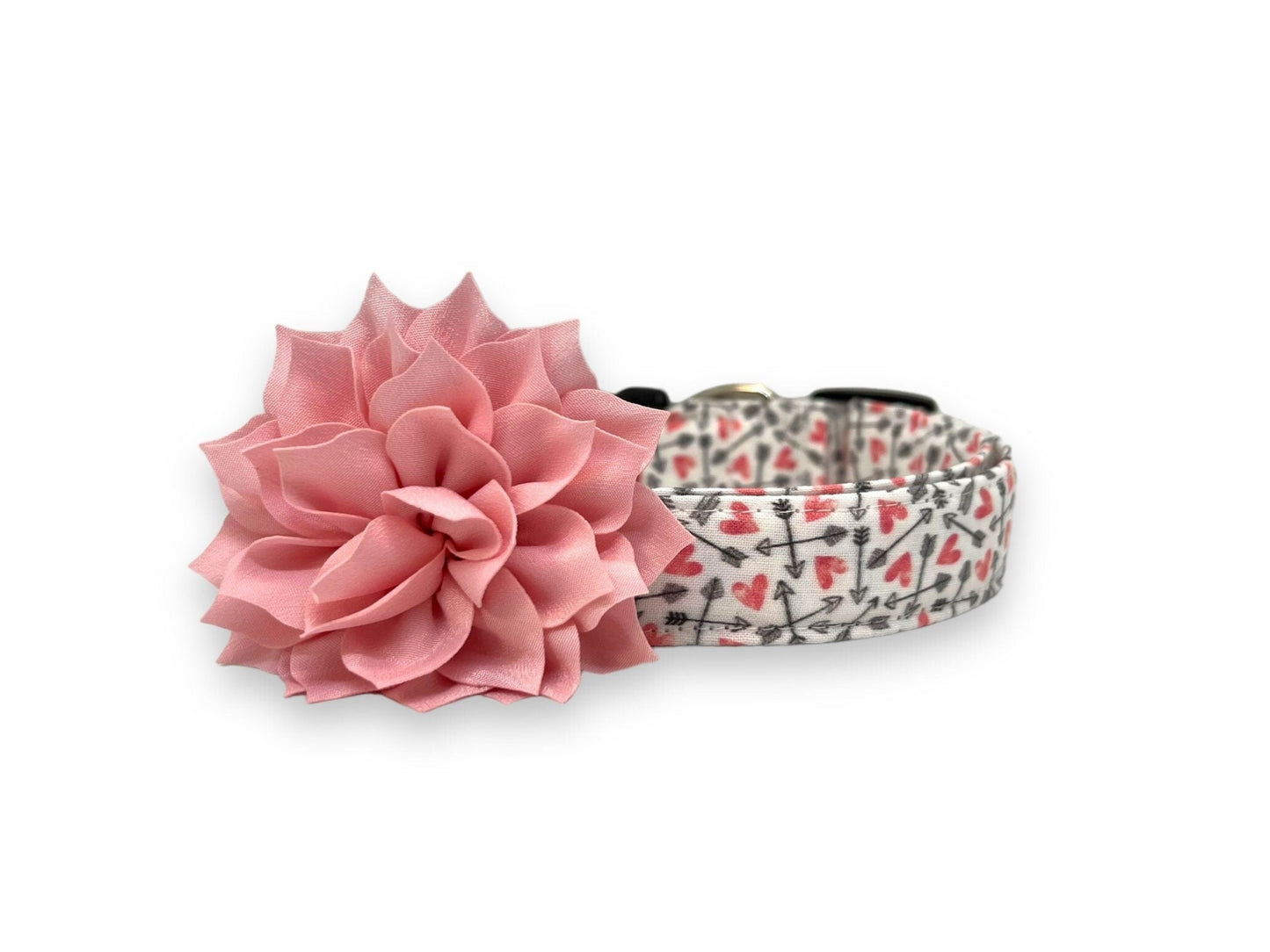 Valentine’s Day dog collar with pink hearts and black arrow pattern and removable light pink dog collar flower embellishment
