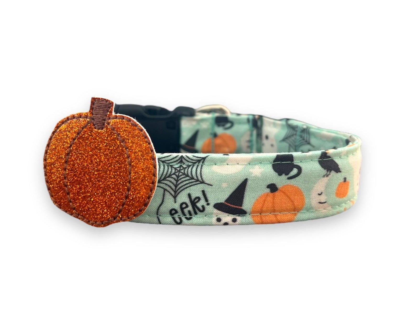 Halloween-themed dog collar with a pumpkin charm on a white background