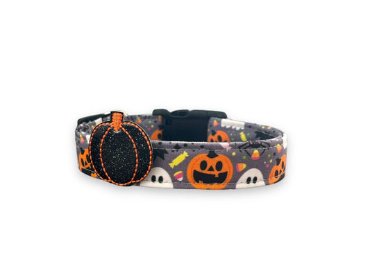 Halloween-themed dog collar with pumpkins and ghosts on a white background