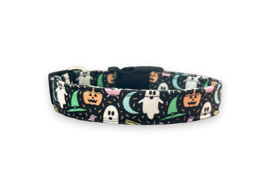 Halloween-themed dog collar with ghosts, pumpkins, and cats on a black background.