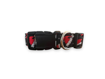 Black Christmas dog collar with red Santa hats and white snowflakes