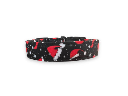 Black Christmas dog collar with red Santa hats and white snowflakes
