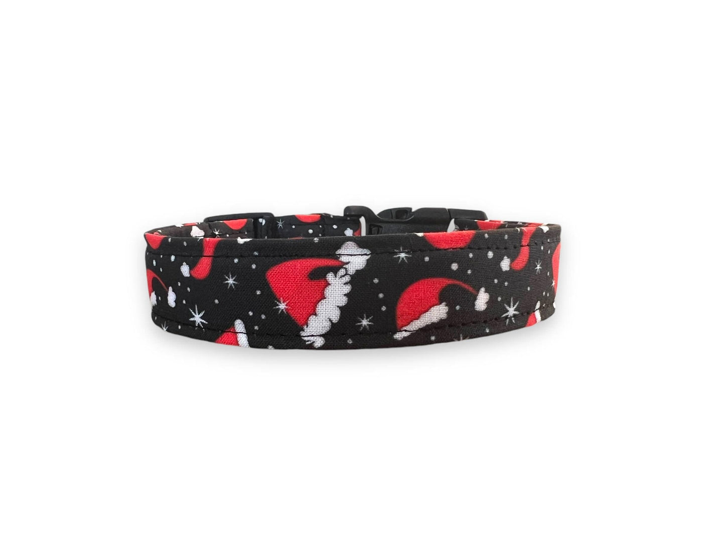 Black Christmas dog collar with red Santa hats and white snowflakes