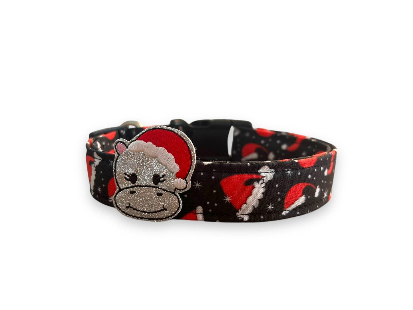 Black Christmas dog collar with red Santa hats and white snowflakes