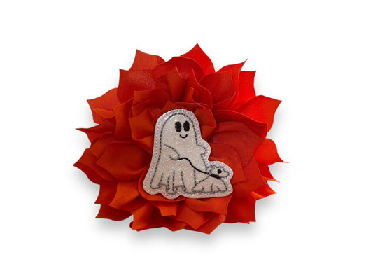 Sparkly ghost walking a dog embellishment on a layered petal dog collar flower, shown with elastic loop attachment.