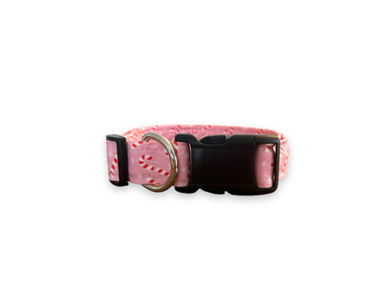 Light pink Christmas dog collar decorated with peppermint candy canes and snowflakes