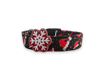 Black Christmas dog collar with red Santa hats and white snowflakes
