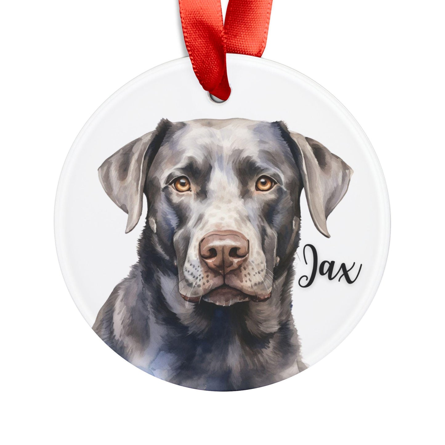 Round acrylic Christmas ornament featuring a watercolor silver Labrador, personalized with the dog’s name and finished with a red ribbon for hanging.