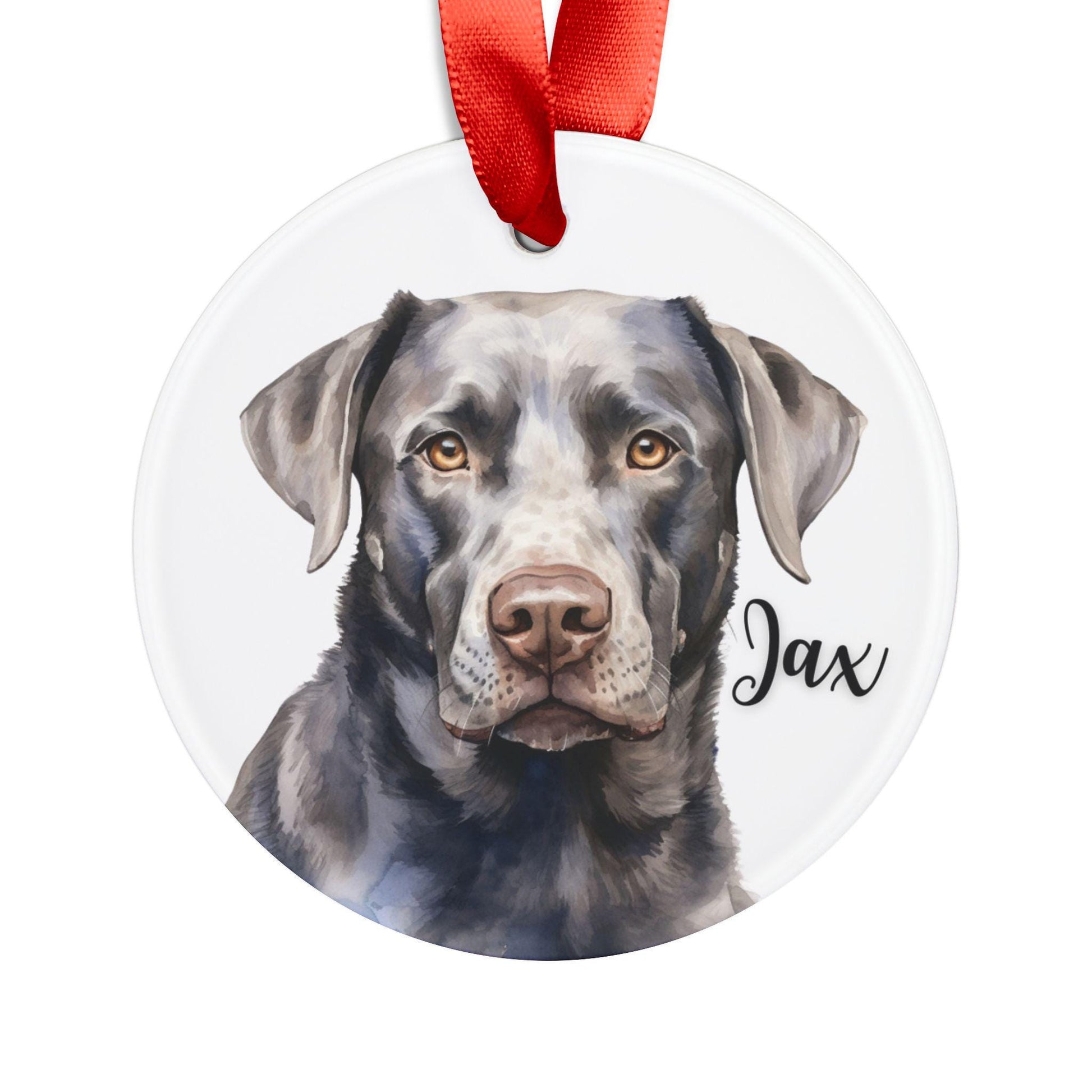 Round acrylic Christmas ornament featuring a watercolor silver Labrador, personalized with the dog’s name and finished with a red ribbon for hanging.