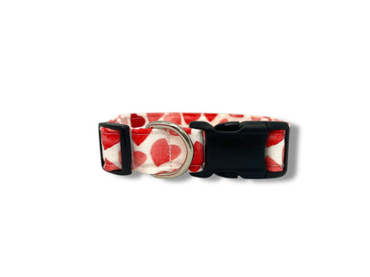 Dog collar with red heart pattern on a white background