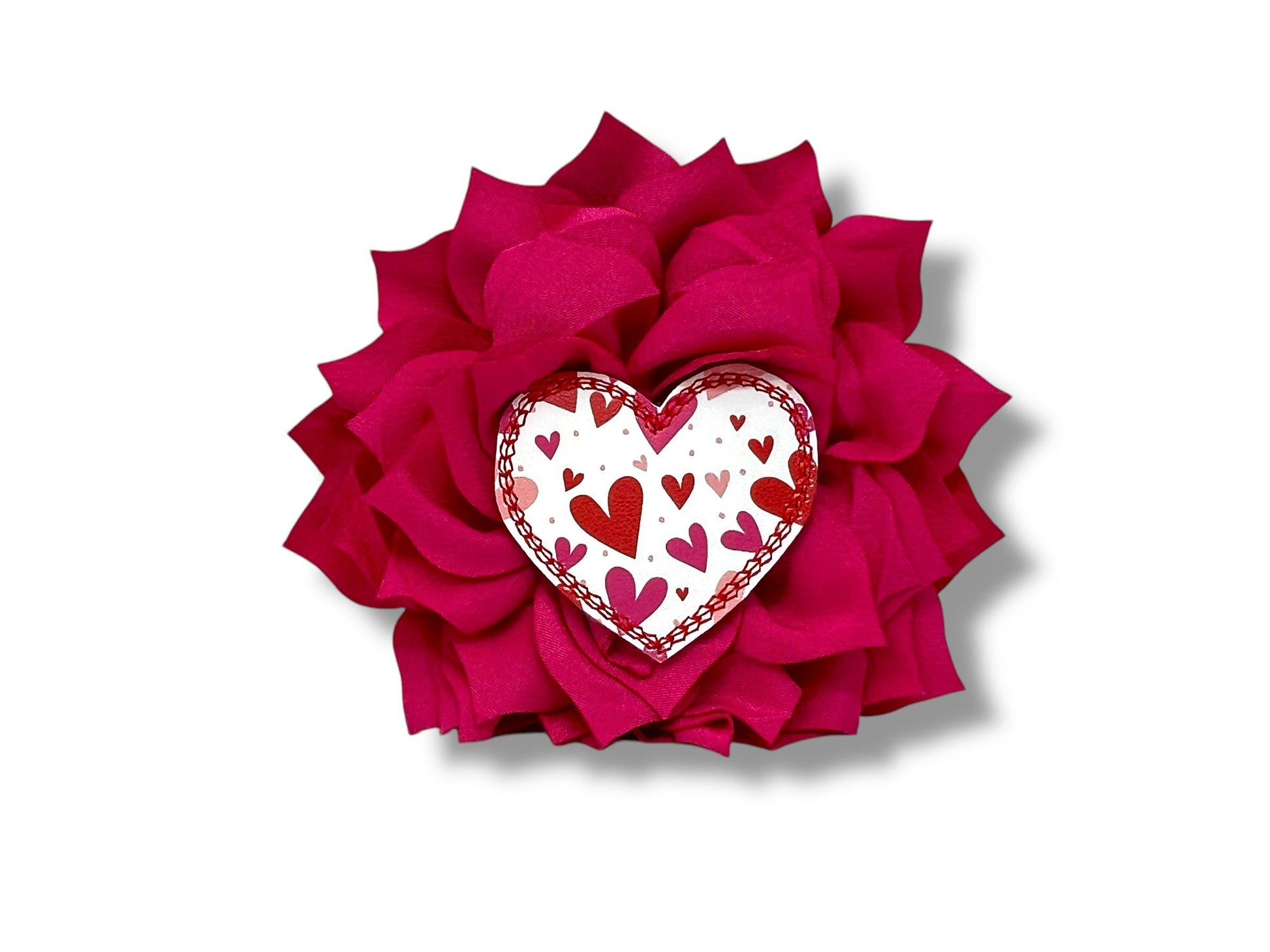 Valentine’s Day dog collar flower with heart embellishment and fluffy layered petals, shown in a 4-inch shocking pink size with elastic collar loop.