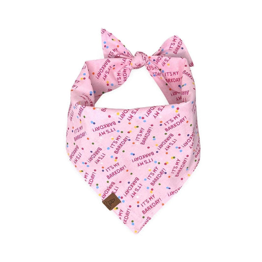 Pink dog bandana with "It's My Barkday" print and confetti accents for a birthday celebration.