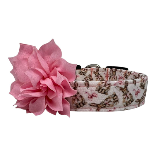 Pale pink dog collar with Easter bunny illustrations and pink coquette bows in a vintage cottagecore style with removable light pink dog collar flower.