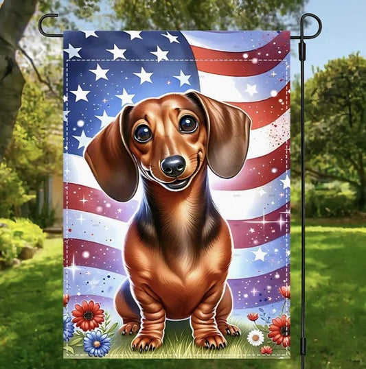 Patriotic Dachshund garden flag with a smiling Dachshund sitting in front of an American flag, surrounded by red, white, and blue floral accents.