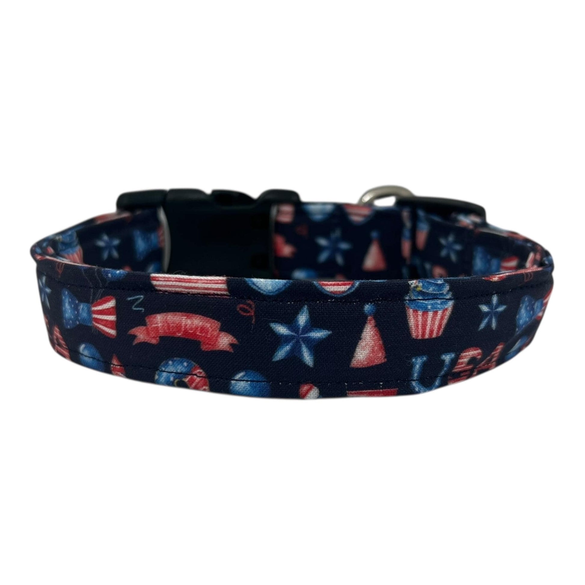 Navy blue 4th of July dog collar decorated with red, white, and blue icons like popsicles, BBQ grills, fireworks, and balloons.