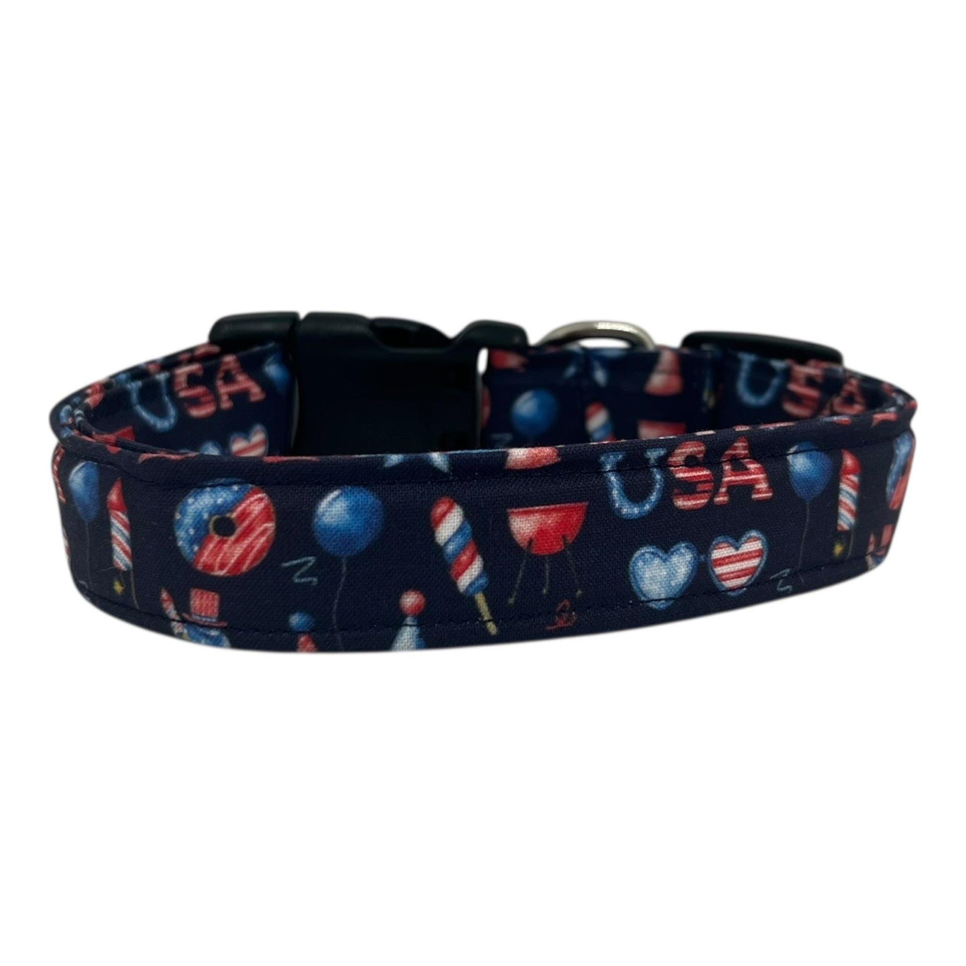 Navy blue 4th of July dog collar decorated with red, white, and blue icons like popsicles, BBQ grills, fireworks, and balloons.