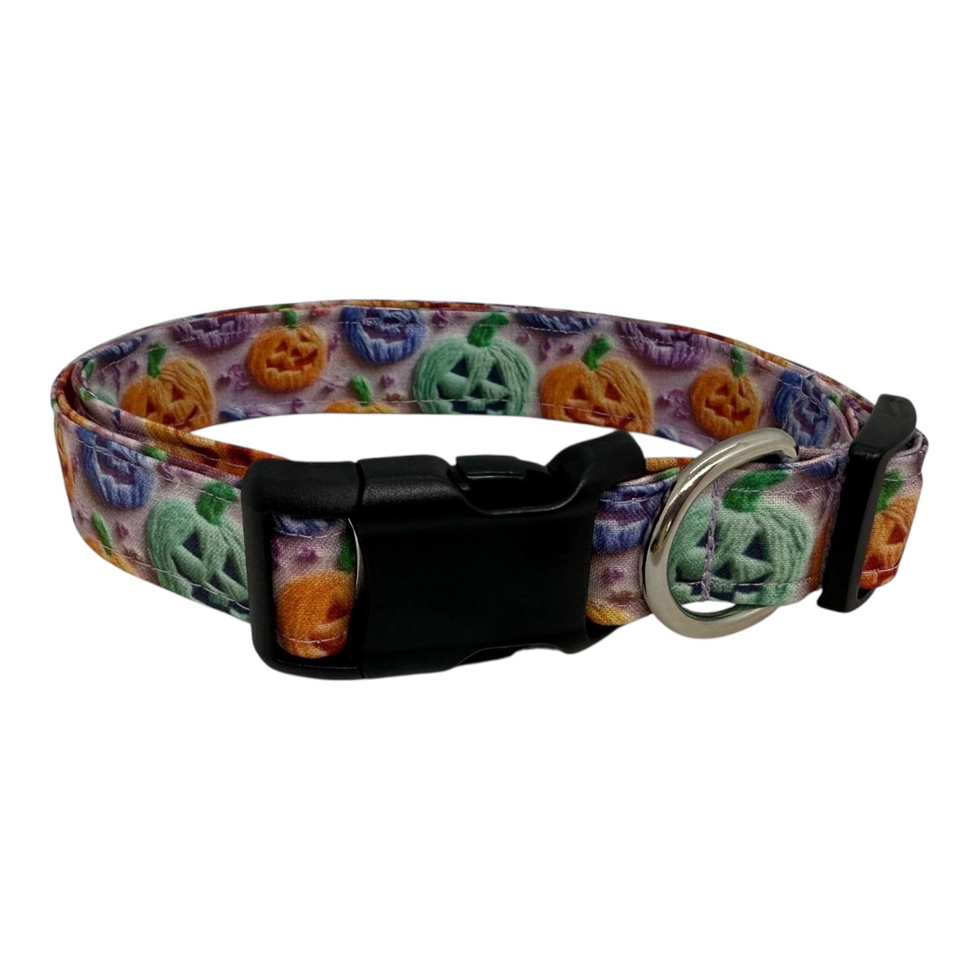 Halloween dog collar with rainbow jack-o’-lanterns in orange, green, purple, and blues.