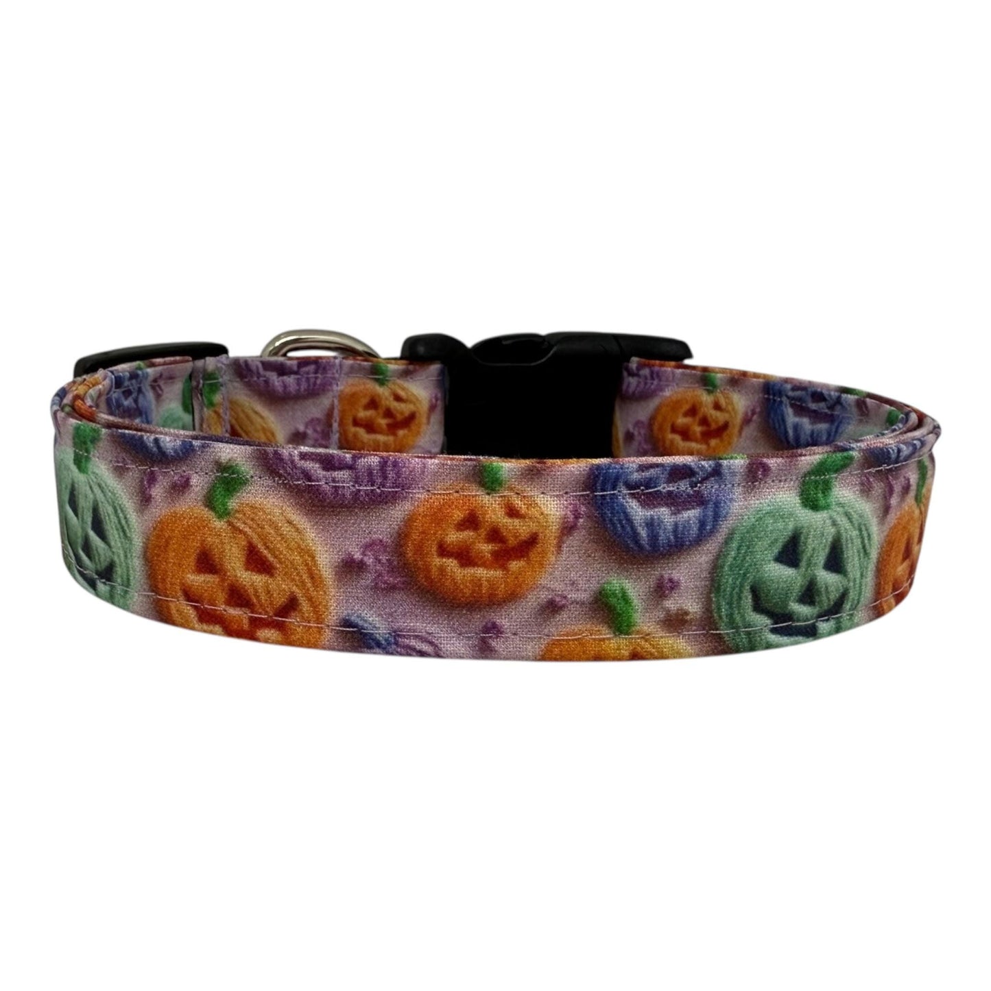 Halloween dog collar with rainbow jack-o’-lanterns in orange, green, purple, and blue.