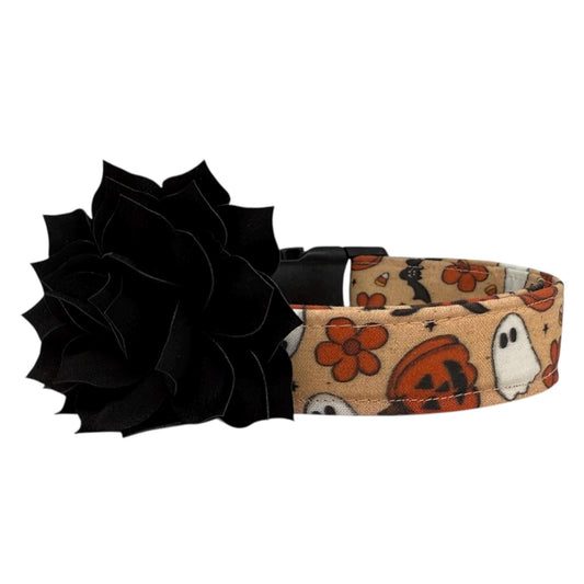 Black flower and Halloween-themed dog collar on a white background