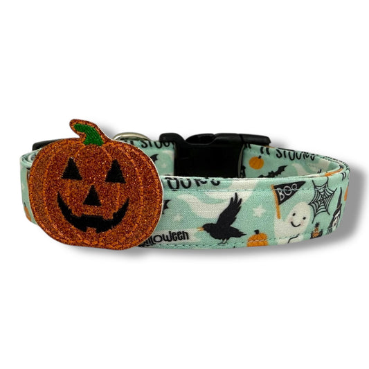Pale Sea Glass Halloween dog collar with ghosts, spider webs, skeletons, pumpkins, witch hats, and removable jack-o’-lantern embellishment.